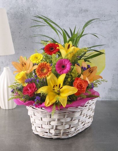 Plant with Flower Arrangement in a Basket - Product image