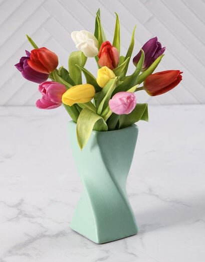 Magnificent Mixed Tulips In A Twisty Vase