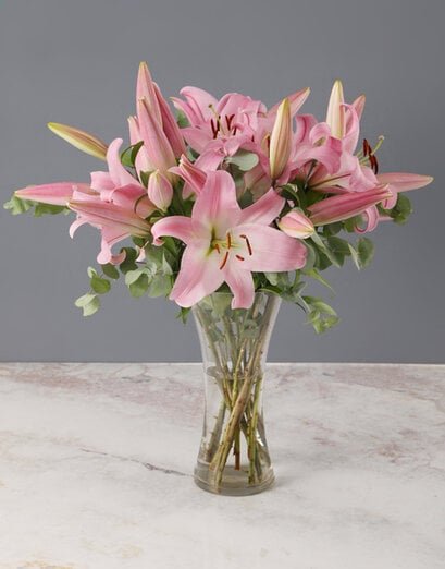 Stargazer Lilies in a Glass Vase