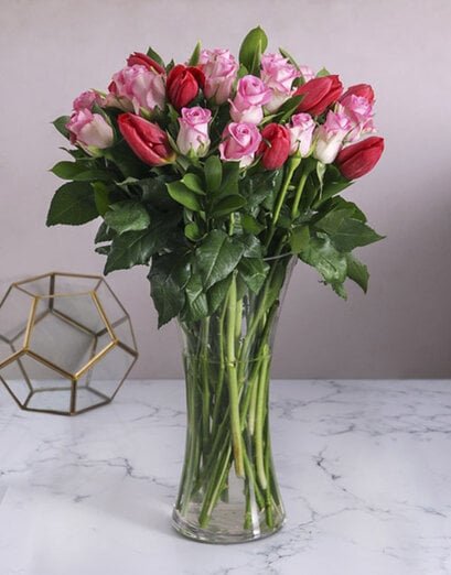 Red Tulips And Pink Roses In Vase