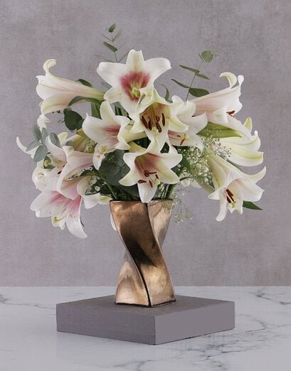 St Joseph Lilies in Twisty Bronze Vase - Product image
