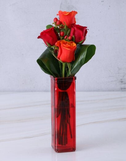 Cherry Brandy Roses In Red Vase - Product image
