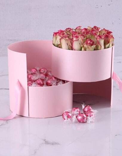 Variegated Roses And Chocolate Arrangement - Product image