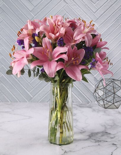 Blushing Bright Pink Lilies In Vase