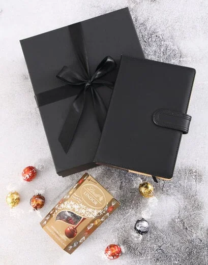 Black Notebook And Chocs