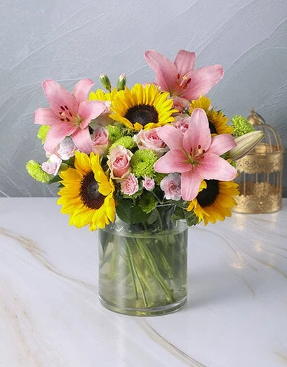Bright Mix of Sunflowers in a Large Glass Vase - Product image