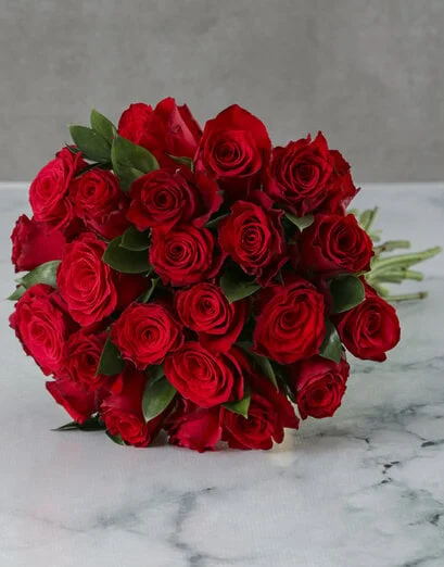Bunch Of Lovely Red Roses In Craft Paper - Product image