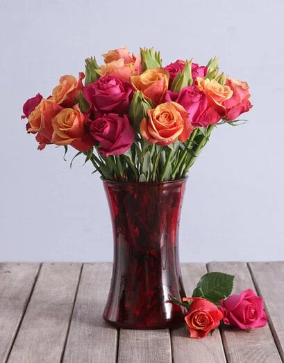 Cherry Brandy and Cerise Roses in a Vase - Product image