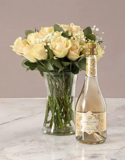 Graceful Peach Roses in Glass Vase - Product image