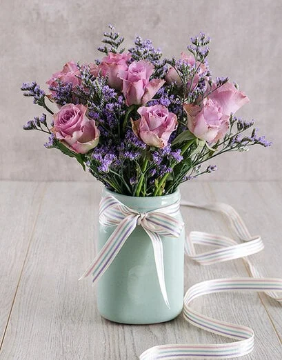 Lilac Roses in Mint Ceramic Vase - Product image