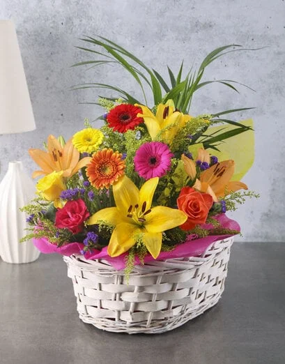 Plant with Flower Arrangement in a Basket - Product image