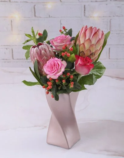 Pretty Pink Proteas In Twisty Vase - Product image