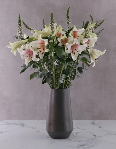 St Joseph Lilies in Black Vase - Product image
