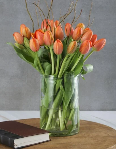 Sun Kissed Tulips In Clear Vase - Product image