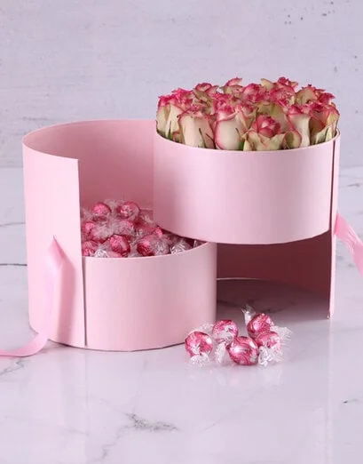 Variegated Roses And Chocolate Arrangement - Product image